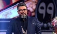 انتقاد شدید از عکس جنجالی رضا رشیدپور با عوامل برنامه عشق ابدی