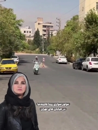 تصاویری از موتورسواری رویا جاویدنیا در خیابان‌های تهران