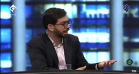 خوش و بش پزشکیان با برادرِ محسن رضایی در یک جلسه