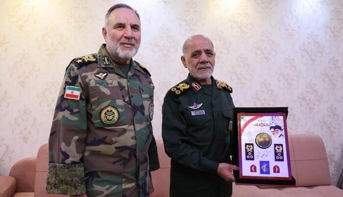 اعطای درجه سپهبدی به شهیدان غلامعلی رشید و علی شادمانی