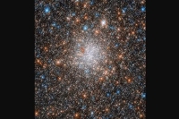 درخشش خیره‌کننده خوشه ستاره‌ای کروی در عکس روز ناسا
