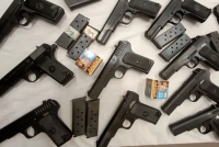 کشف 15 قبضه اسلحه از چمدان دو مسافر اتوبوس