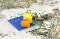 اگر دلار سهمیه‌ای بگیریم از دریافت ارز مسافرتی محروم می‌شویم؟