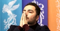 تصویری عجیب از نوید محمدزاده با یک پلنگ وحشی